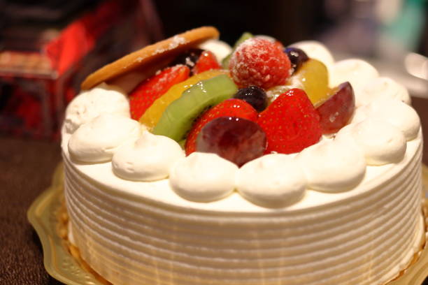 istock whole cake with fruits 1045798842