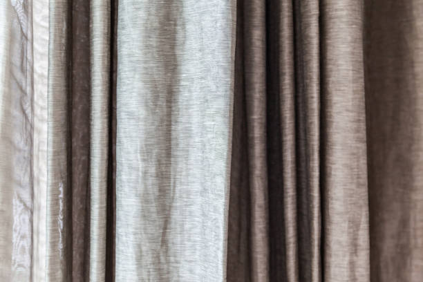 istock gray curtains at the windows 1045811530