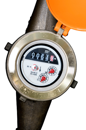 Close-up of water meter isolated on white with clipping path.