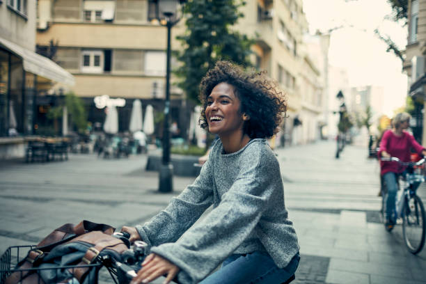 istock Friends Riding Rented Bicycles In A City 1045817954