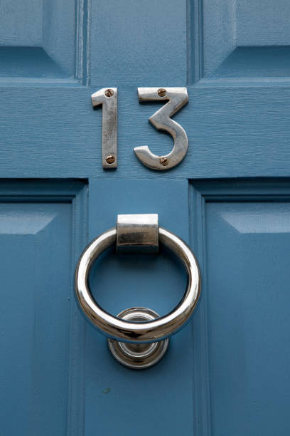 istock Thirteen Number on Blue Door 1045818872