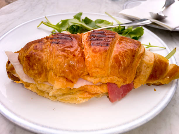 istock A croissant with ham and letuce 1045838352