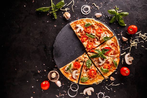 Fresh Italian pizza Fresh Italian pizza with mushrooms tomatoes and cheese, space for your text basil photos stock pictures, royalty-free photos & images