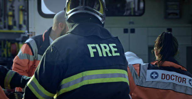 istock Paramedics and firefighters at car accident 1045845508