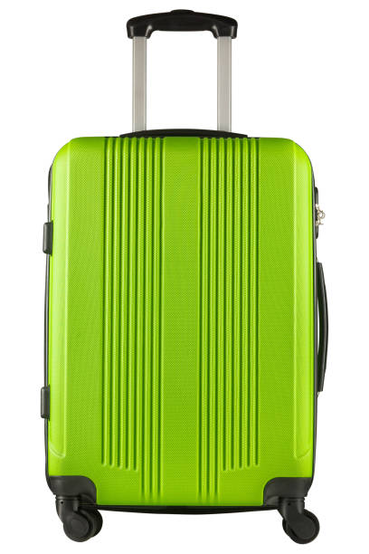 Green plastic suitcase isolated on white background