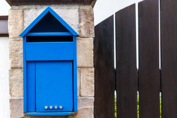 istock A beautiful mailbox hangs waiting for newspapers, parcels and letters. 1045850252