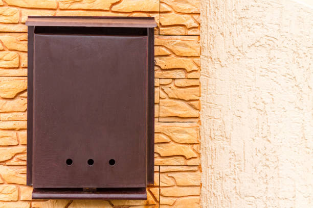istock A beautiful mailbox hangs waiting for newspapers, parcels and letters. 1045850266