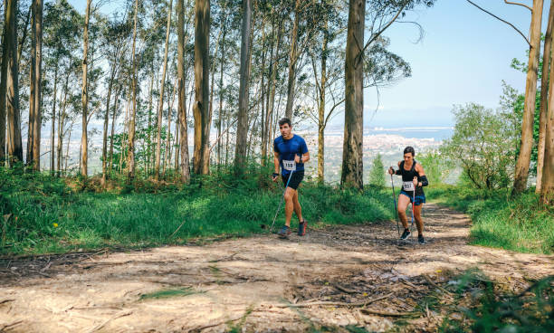 istock Young woman and man doing trail 1045853840