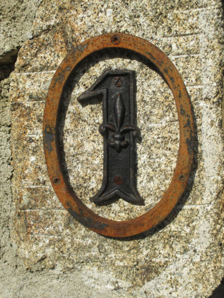 istock Street number 1  Fleur de Lys wrought iron 1045863010