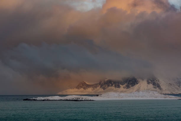 istock Dramatic Sky over the Winter Norwegian Bay 1045866784