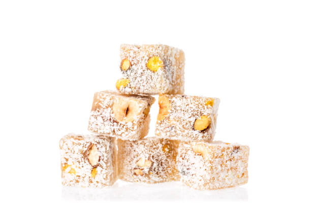 istock Turkish delight lokum with pistachio nuts isolated on a white background 1045866898