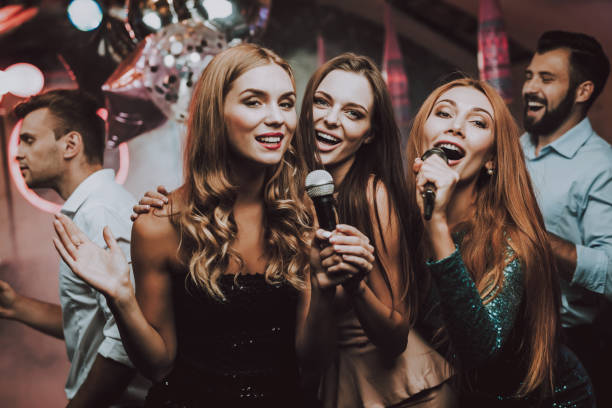istock Girls Sing. Have Fun. Cheerful. Smile.Party Maker. 1045879654