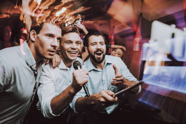 istock Young People. Club. Sing. Microphone. Self-Stick. 1045879664