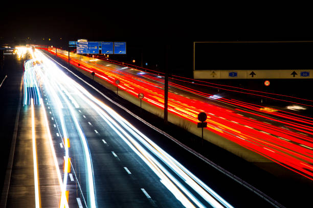 istock Night traffic trails motion blur highway 1045880792