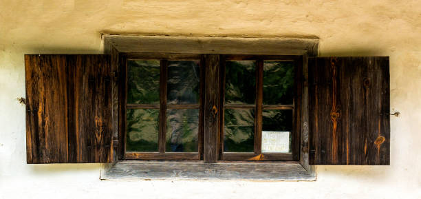 istock Old wooden windows with locks 1045884284