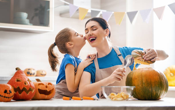 istock family preparing for Halloween. 1045899726