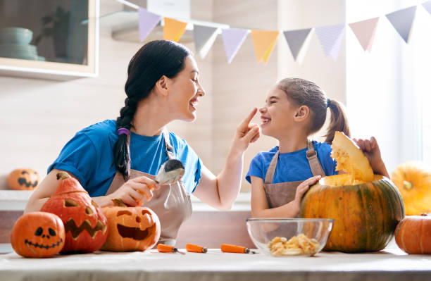 istock family preparing for Halloween. 1045899744