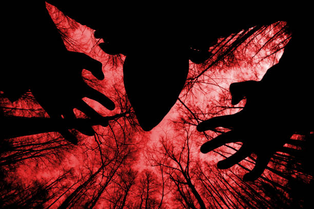 istock ghostly silhouette in spooky dark forest. halloween concept 1045903064
