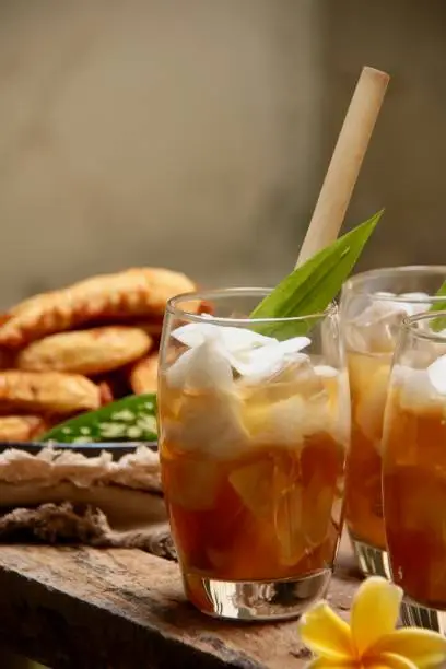 Photo of Es Tambring, the Balinese Drink of Iced Coconut with Palm Sugar and Tamarind