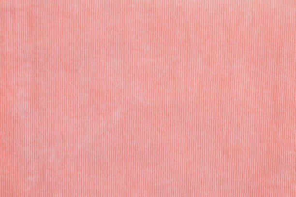 istock orange and pink color texture of fabric from a textile material 1045910436