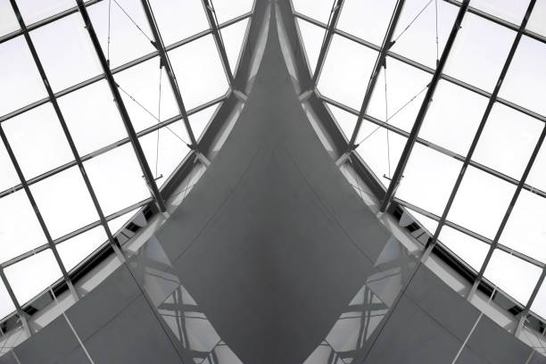 istock Computer graphic image of grid structure resembling domed ceiling fragment of metal and glass. Abstract modern architecture. Contemporary architectural fiction. 1045911940