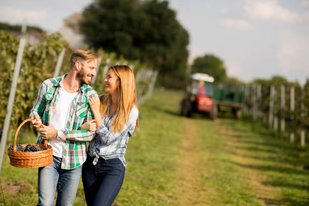 istock Young couple in the vineyard 1045913024