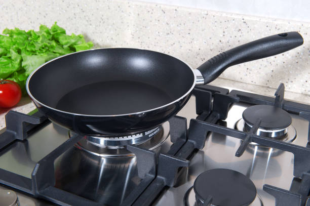 istock Black frying pan on a plate 1045918928