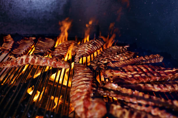 istock Pork Ribs Cooking On Grill Closeup 1045921792