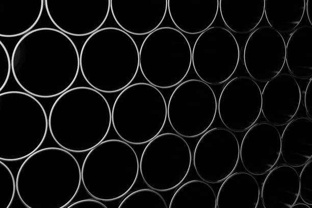 istock Stack of shiny metal steel pipes 1045934898