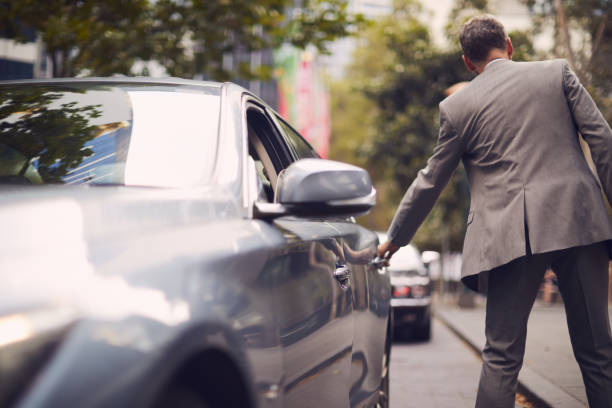 istock Business on the move, riding a car. 1045935130