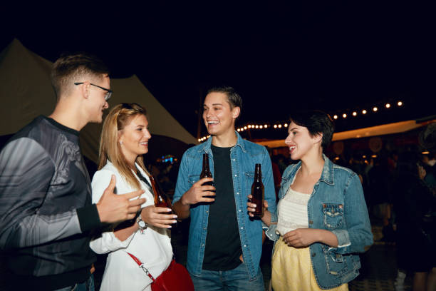 istock Friends Having Fun On Party In Evening 1045938182