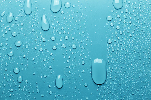 Condensation on glass window with water drops