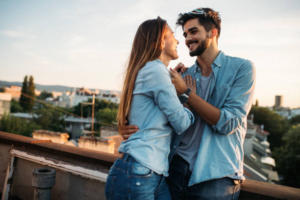 istock Beautiful couple hugging and smiling 1045945142