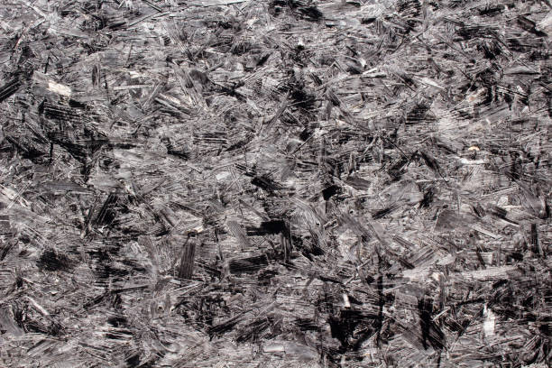 istock Texture of chipboard painted black 1045945724