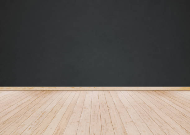 istock Black cement wall with Wooden floor 1045950618