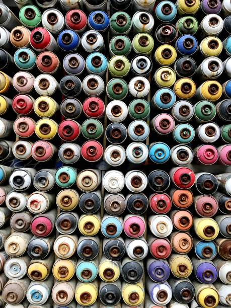 istock Colorful and old spray paint cans 1045951172