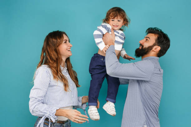 istock A happy family on blue background 1045954030