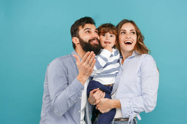 istock A happy family on blue background 1045954042