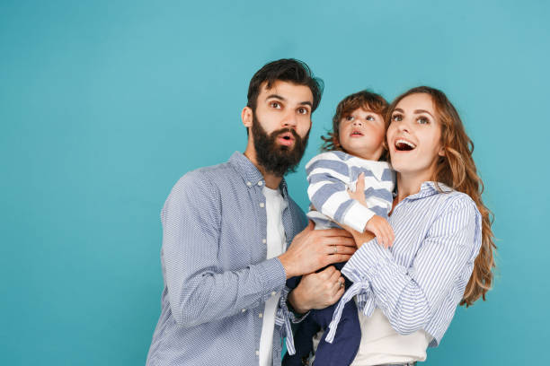 istock A happy family on blue background 1045954044