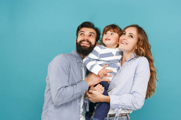 istock A happy family on blue background 1045954058