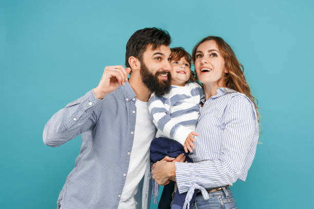 istock A happy family on blue background 1045954258
