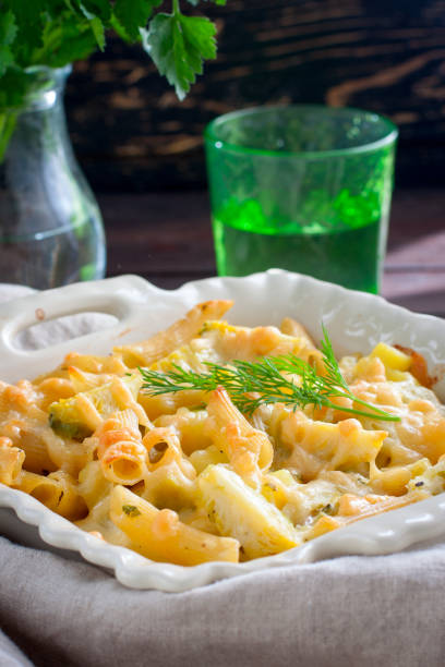 istock Vegetarian pasta casserole with Brussels sprouts, cheese and potatoes, selective focus 1045965828