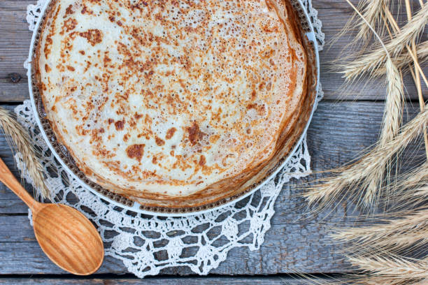 istock Pancakes on the table with a lace napkin, selective focus 1045966132