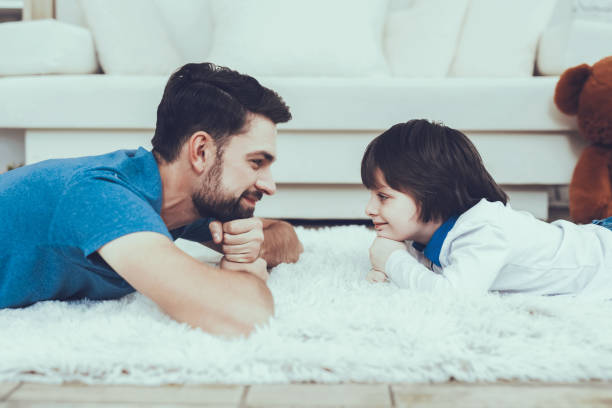istock Smile Kid. Father. Leisure Time. Man. Smile. Rest. 1045975306