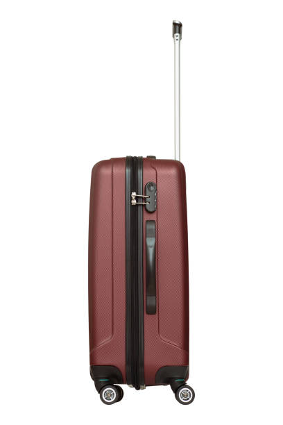 istock Burgundy / marsala plastic suitcase isolated on white background 1045975966