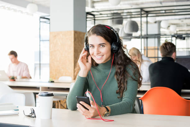 istock Smiling Young Woman in Co-Working Space 1045982134