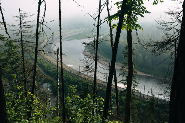istock Railway near the river 1045983586