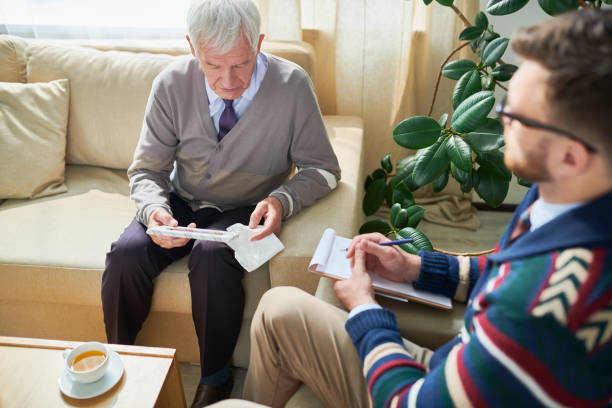 istock Senior Man in Psychological Therapy 1045983854