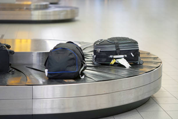 istock Baggage claim. Abstract luggage line. 1045987188