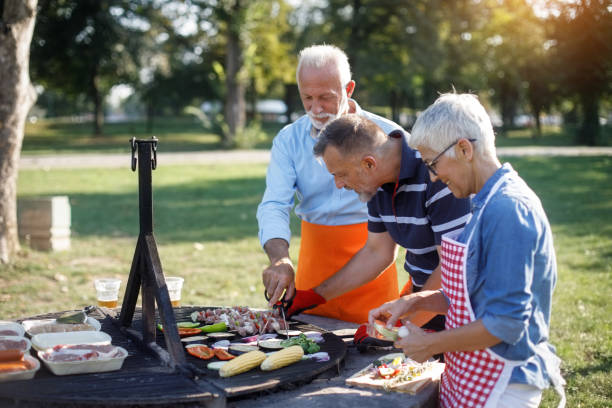 istock Senior people having a picnic 1045987498